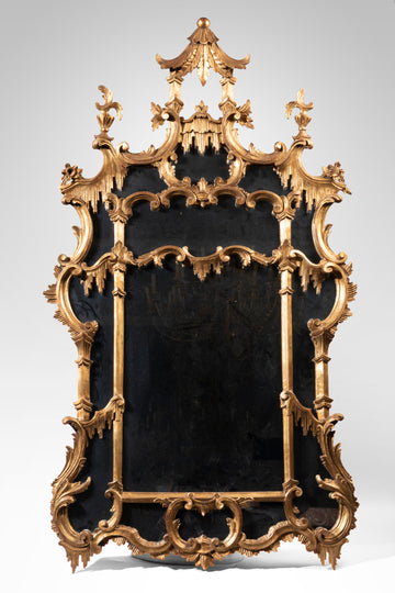 AN IMPRESSIVE LATE 19TH CENTURY GEORGES II ST. GILTWOOD WALL MIRROR.