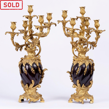 A CHARMING AND HIGH-QUALITY PAIR OF 19TH CENTURY LOUIS XV  ST. CANDELABRAS.
