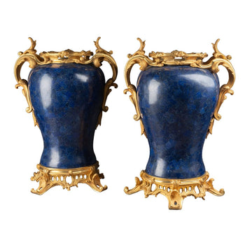 A PAIR OF CONTINENTAL 20th CENTURY LOUIS XV ST. ORMOLU AND LAPIS LAZULI VASES.