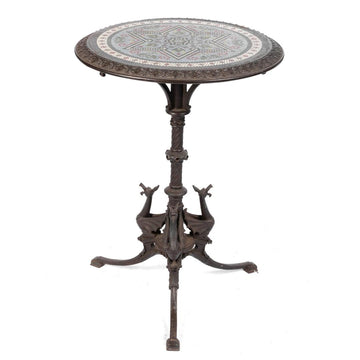 A 19TH CENTURY ORIENTALIST PEDESTAL TABLE IN CAST IRON.