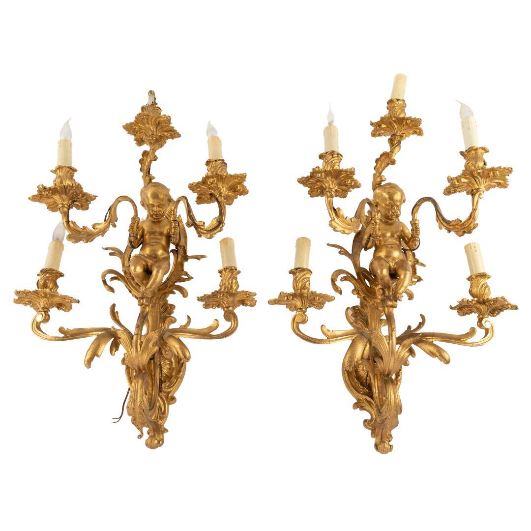 A CHARMING PAIR OF FRENCH 19TH CENTURY LOUIS XV STYLE WALL SCONCES. - Galerie Rosiers
