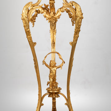 A FRENCH 19TH CENTURY GILT AND PATINATED BRONZE JARDINIERE ON STAND SIGNED MILLET.