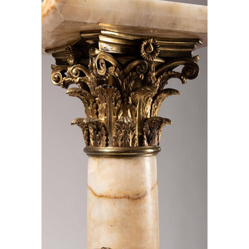A FRENCH 19TH CENTURY JAPONISMUS ONYX AND ORMOLU COLUMN WITH A SWIVEL TOP.