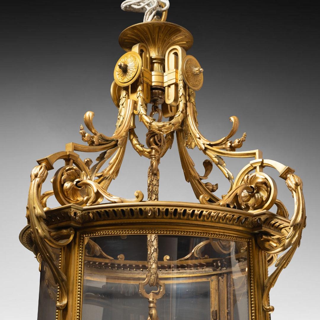 A MONUMENTAL FRENCH 19TH CENTURY LOUIS XVI ST. ORMOLU AND GLASS LANTERN. - Galerie Rosiers