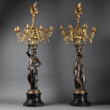 A PAIR OF FRENCH 19TH CENTURY NEOCLASSICAL ST. BRONZE, ORMOLU AND BLACK MARBLE CANDELABRAS SIGNED  ROBERT L.V.E (1821-1874).