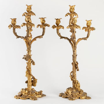 A PAIR OF FRENCH 19TH CENTURY ORMOLU CANDELABRAS.