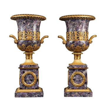 A PAIR OF FRENCH TURN OF THE CENTURY EMPIRE ST. AMETHYST AND GILT-BRONZE URNS.