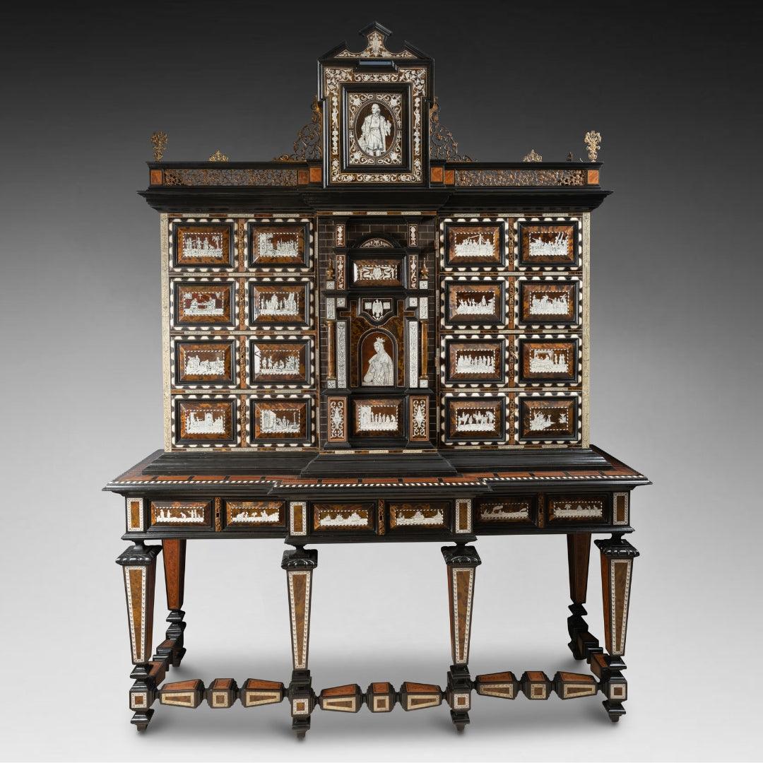 A STRIKING EARLY 19TH CENTURY SPANISH EBONIZED FRUITWOOD, ROSEWOOD, IVORY AND TORTOICE SHELL CABINET. - Galerie Rosiers