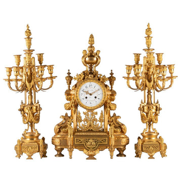 A STUNNING AND EXTREMELY DETAILED FRENCH 19 TH CENTURY LOUIS XVI ST. THREE-PIECE ORMOLU  CLOCK SET.