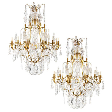 A STUNNING PAIR OF FRENCH LATE 19TH CENTURY LOUIS XV ST. ORMOLU AND CRYSTAL CHANDELIERS.