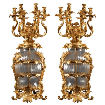 AN  IMPOSING PAIR OF CONTINENTAL XXth CENTURY LOUIS XV St. CUT CRYSTAL AND GILT BRONZE CANDELABRAS.