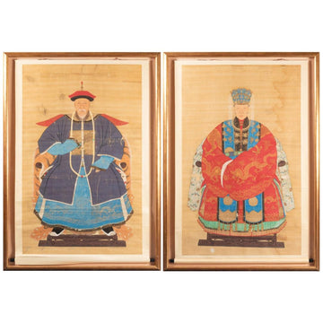 AN ORIGINAL AND DECORATIVE PAIR OF CHINESE ANCESTORS FROM THE DAOGUANG PERIOD (1820-1850).